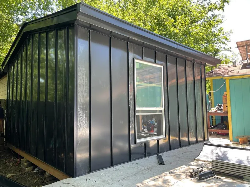 Black standing seam metal wall panels for Roof Inspection in Lakewood